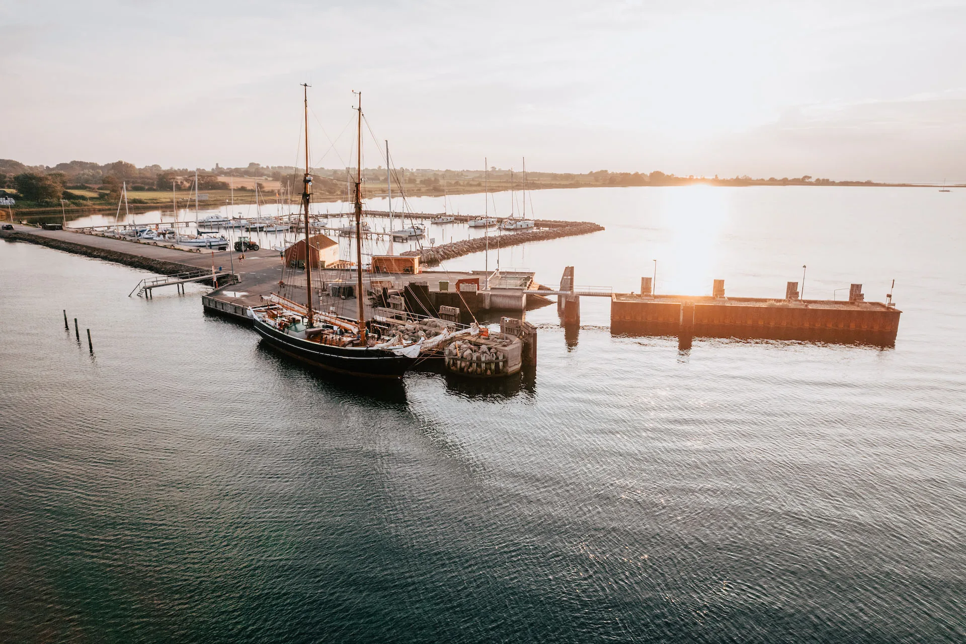 Aron in Lyø harbour in warm evening light