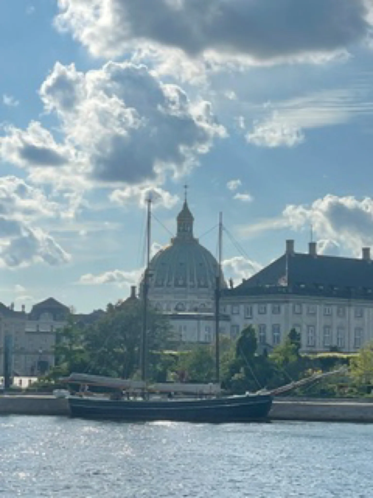 Aron moored in Copenhagen with the Marble Church dome behind
